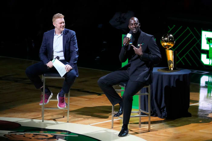 Basketball Hall of Famer and former Boston Celtic, Kevin Garnett speaks with Brian Scalabrine during the number retirement ceremony after the game between the Boston Celtics the Dallas Mavericks at TD Garden. Mandatory Credit: Gregory Fisher-USA TODAY Sports